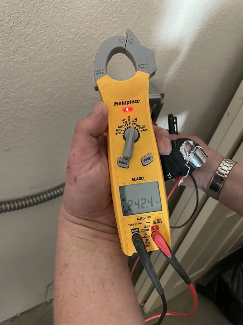 Voltage testing with clamp meter during Generator Installation in McCalla